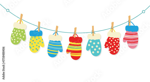 Colorful winter mittens hanging on a clothesline for drying.