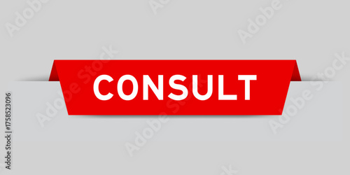 Red color inserted label with word consult on gray background