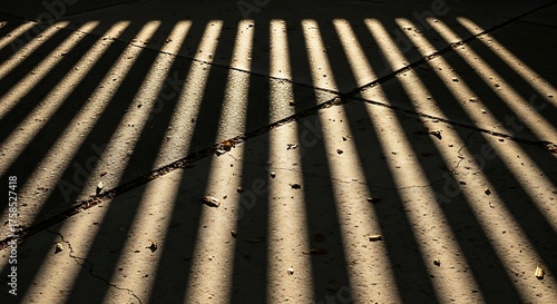 Rhythmic interplay of light and shadow casting linear patterns below