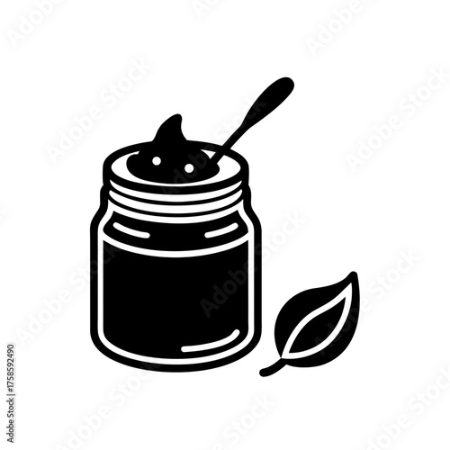 Jar of jam with spoon and a leaf on transparent background silhouette