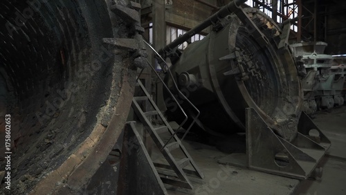 Wallpaper Mural Large industrial steel ladle lying on its side in a foundry. Stock clip Torontodigital.ca