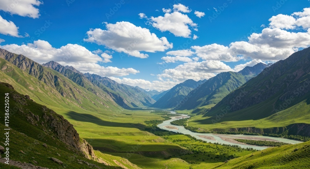 Fototapeta premium Panoramic valley view, verdant meadows, winding river, rugged mountains, bright sunlight, fluffy clouds