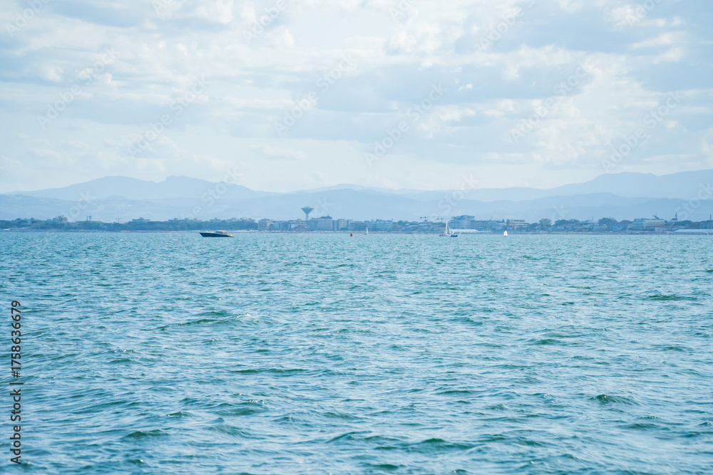 Obraz premium Sporty white yachts on the blue water of the sea. Travel concept