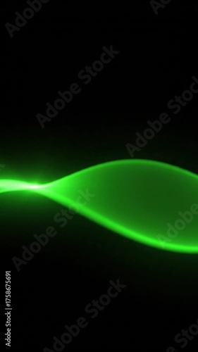 Abstract green light wave animation on black background