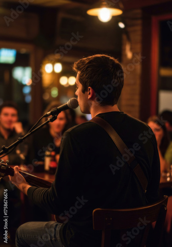 Back view of indie musician's acoustic live performance in crowded cafe, warm lights, people listening. Cosy storytelling vibe, World Music Day, International Jazz Day, Open Mic Night. Vertical reel