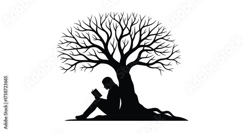 Silhouette of a person reading a book under a bare tree