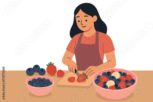 Woman preparing fresh fruit salad in kitchen with berries and tomatoes