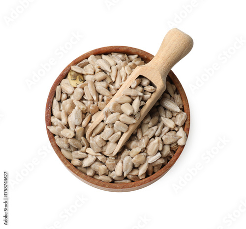 Sunflower seeds with scoop in bowl isolated on white, top view