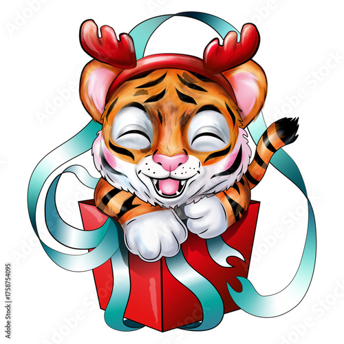 Festive Christmas smiling little tiger cub in a headband with reindeer antlers sitting in a gift red box wrapped in blue ribbons