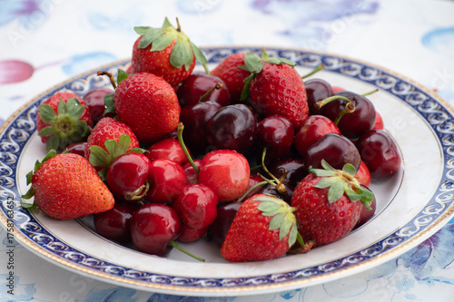 Fresh ripe red fruits and berries, cherry and strawberry, healthy food