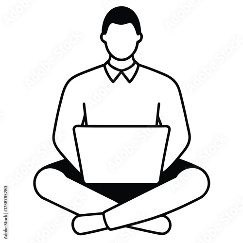 Businessman sitting with laptop working in office environment