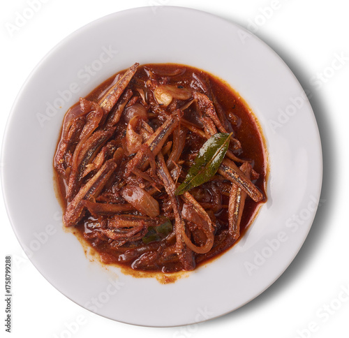 spicy dried sprats on a white plate, fish cooked in a rich red-brown masala sauce with onions and curry leaves, isolated white background, traditional seafood cuisine in indian or sri lankan style
