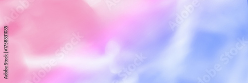 Abstract soft pastel colors background with pink and blue hues and blurred texture.