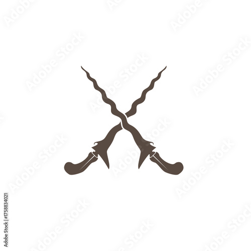 The kris or keris  with its elaborately carved handle and wavy blade