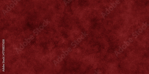 Abstract Elegant dark red background with mottled vintage texture in old fancy background design, texture of colored parchment paper.