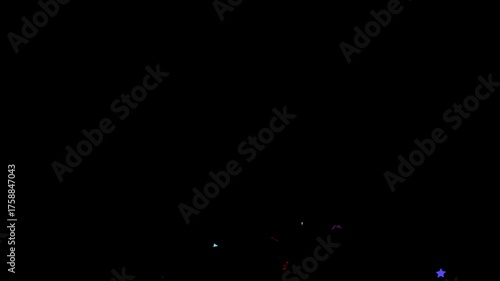 Dynamic celebratory confetti falling against stark black backdrop for joyful party celebrations and festive events