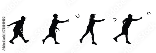 Silhouette of people playing horseshoes game