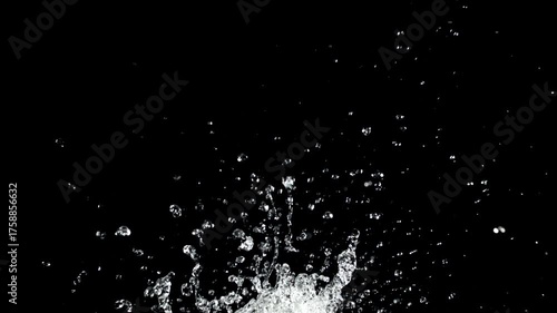 Water droplets rise and fall on a black background. Filmed on a high-speed camera at 1000 fps. High quality FullHD footage