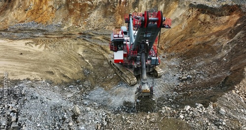 Large excavator digging in open pit mine. Stock clip