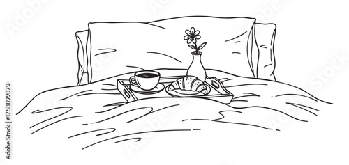Black outline drawing of a breakfast tray on a bed, featuring a cup of coffee, a croissant, and a small vase with a flower.