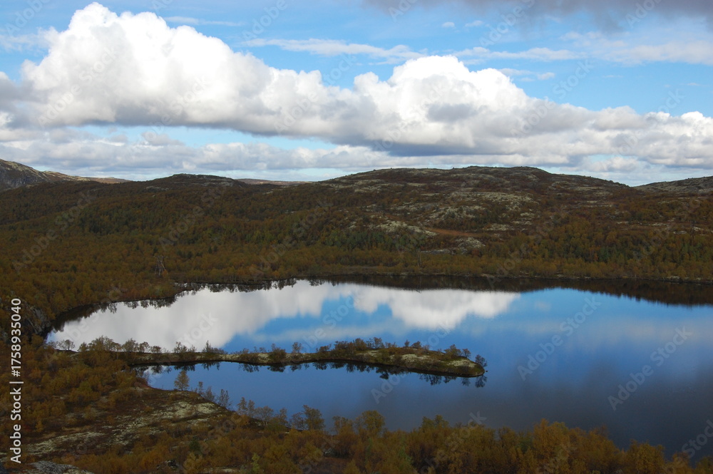 Fototapeta premium A picturesque lake in the Finnish tundra, Sami territory, amazing nature, Karelia, fantastic landscapes, fishing, tourism.