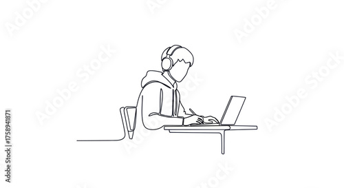 Young person wearing headphones focused on a laptop at a desk.