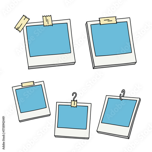 A collection of instant film photos with blue backgrounds attached to a surface with tape and clips.