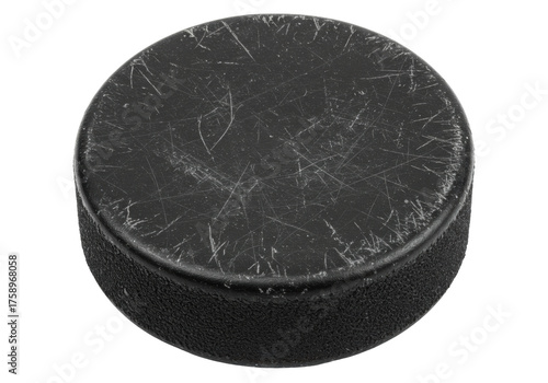 Photography Worn black hockey puck isolated on white, sports equipment for ice hockey games