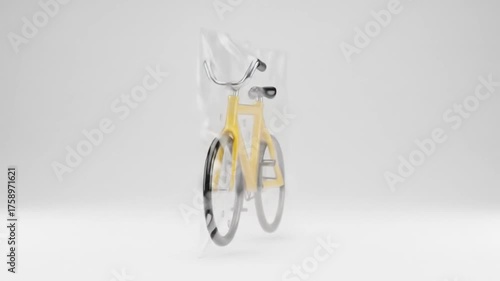 Yellow bicycle inside clear plastic bag