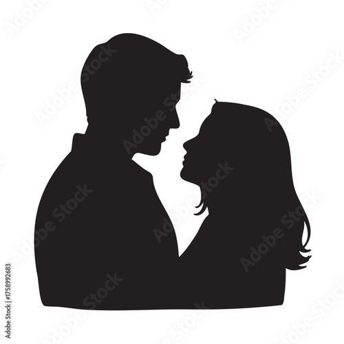 Silhouette of a caucasian young male and female couple facing each other closely in an intimate pose.