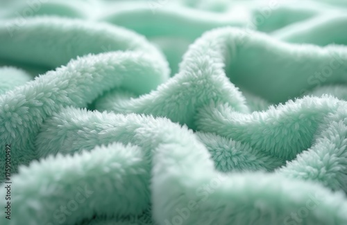 Wallpaper Mural Soft light green fluffy fabric with wavy folds, texture. Close-up view of plush material with relief folds. Fleece blanket with comfortable, cozy appearance. Fuzzy textile with pastel color tone. Torontodigital.ca