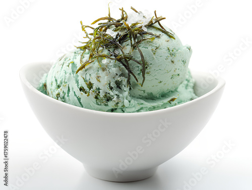 Seaweed ice cream with salt flakes in bowl
