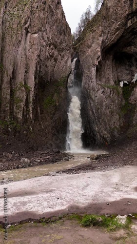 A beautiful view of a waterfall in the North Caucasus Mountains. Landscape and nature of the North Caucasus