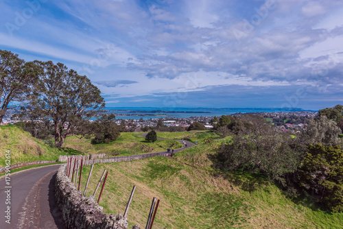 Picturesque autumnal landscape in grassy field, tranquil outdoor setting