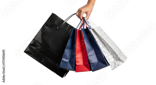 Hand holding shopping bags on black background on transparent background