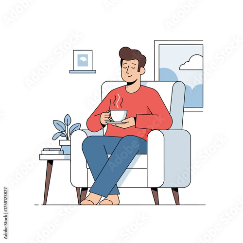 Man enjoying a hot beverage while relaxing in an armchair.