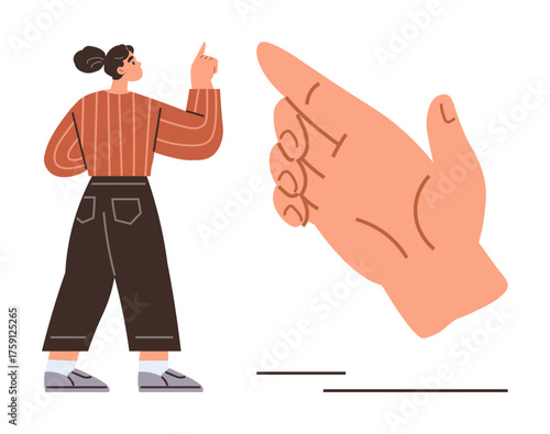 Woman in casual outfit gestures toward oversized hand symbolizing guidance, direction, leadership, or choice. Ideal for self-growth, decision-making, teamwork, motivation, abstract concepts