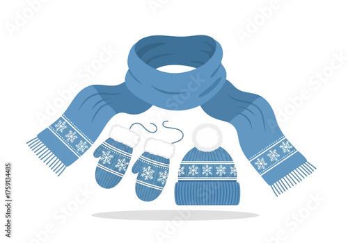 Blue winter set scarf mittens and knitted hat with snowflakes and tassels on white background