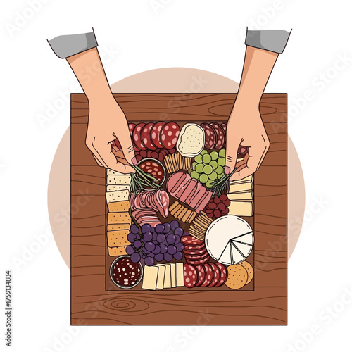 Top-down view of hands arranging a large charcuterie board filled with various meats, cheeses, fruits, and crackers on a wooden table.
