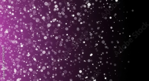 Glittering bokeh lights fade from purple to black in a dynamic, abstract background.
