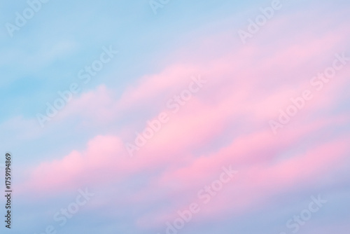 Pastel blue and pink cloudy sky background