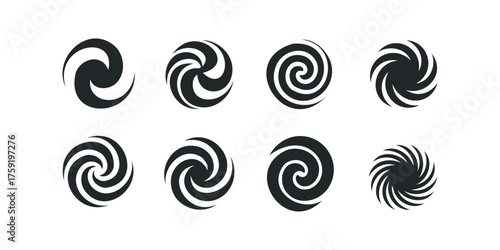 Set of eight black spiral graphic elements