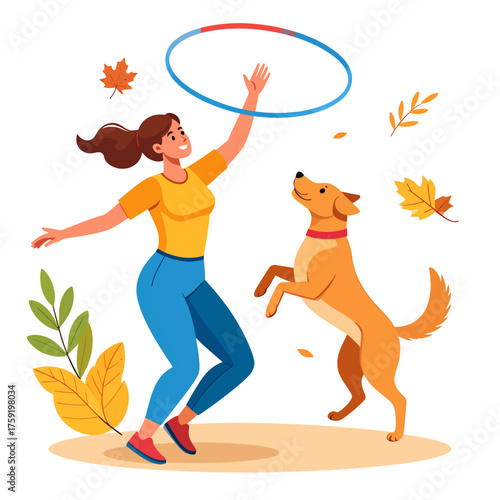 A happy woman playing with her dog and a hula hoop outdoors in an autumn park, surrounded by fall leaves.