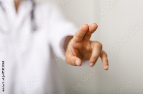 Close-up of a doctor's hand...