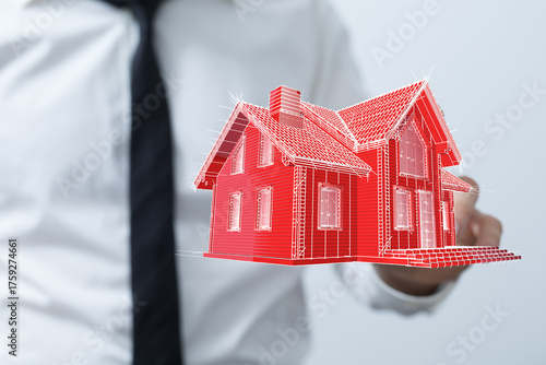 A person's hand holding a r...