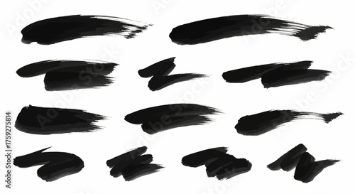 Collection of expressive black ink brush strokes and smudges conveying artistic dynamism and visual texture ideal for graphic design elements and abstract backgrounds