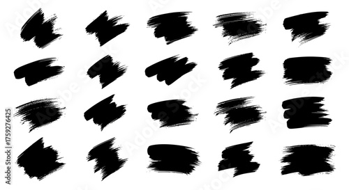 Collection of abstract black brush stroke paint splatters and ink marks forming dynamic shapes for artistic backgrounds and design elements