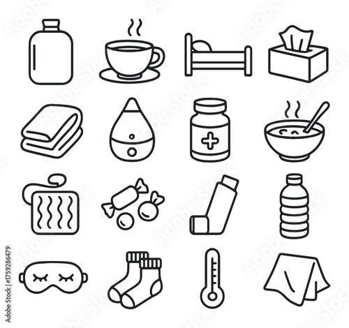 Essential cold remedies: tea, medicine, tissues, and blanket arrangement for relief