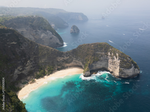 Kelingking beach and famous cliff in Nusa Penida island aerial drone view