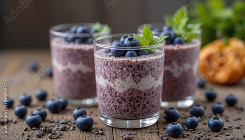 Chia seeds pudding glasses with blueberries. Healthy breakfast concept